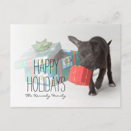 クリスマスのギフトを持つ子犬 シーズンポストカード (正面)