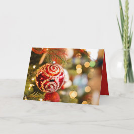 クリスマスのグリッターの赤い木のオーナメントの休日カード シーズンカード