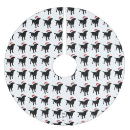 クリスマスのサンタクロースの帽子を身に着けている黒い実験室犬 ブラッシュドポリエステルツリースカート