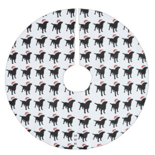 クリスマスのサンタクロースの帽子を身に着けている黒い実験室犬 ブラッシュドポリエステルツリースカート