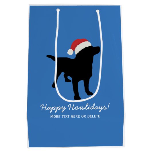 クリスマスのサンタクロースの帽子を身に着けている黒い実験室犬 ミディアムペーパーバッグ (裏面)