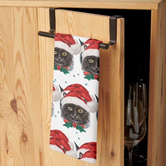 クリスマスのサンタ帽子をかぶったかわいい黒猫 キッチンタオル (三つ折り)