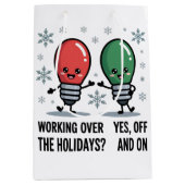 クリスマスのジョークで働おもしろいく ミディアムペーパーバッグ (正面)