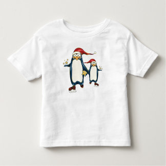 クリスマスのスケートで滑るのペンギン トドラーTシャツ