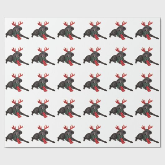 クリスマスのトナカイとして服を着る黒いトイプードル犬 ラッピングペーパー (フラット)