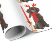 クリスマスのトナカイとして服を着る黒いトイプードル犬 ラッピングペーパー (ロールコーナー)