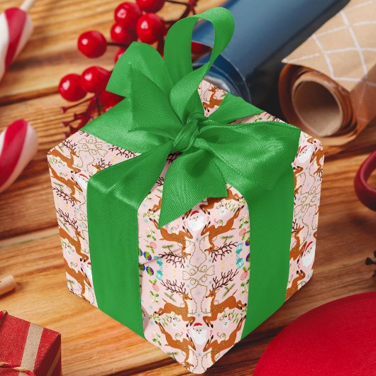 クリスマスのトナカイのピンクのシームレスなパターン ラッピングペーパー