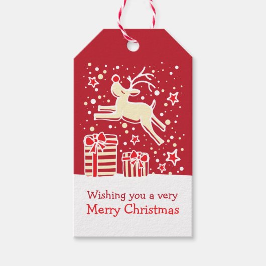 クリスマスのトナカイはギフトを越えて赤いラベル ギフトタグ (正面)