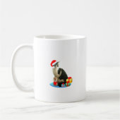 クリスマスのトラ猫と可愛い小さな天使 コーヒーマグカップ (左)