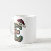 クリスマスのニットセーターの文字 E サンタ帽子 コーヒーマグカップ (正面左)