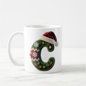 クリスマスのニットセーターの文字Cサンタ帽子 コーヒーマグカップ (左)