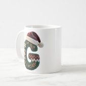 クリスマスのニットセーターの文字Gサンタ帽子 コーヒーマグカップ (正面左)