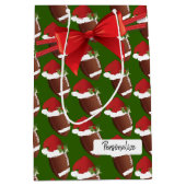 クリスマスのフットボールパターン ミディアムペーパーバッグ (正面)