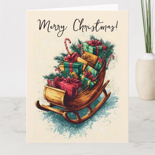 クリスマスのプレゼントでいっぱいのビンテージのそり カード (正面)