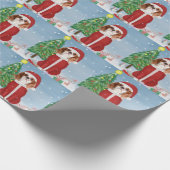 クリスマスのプレゼントで雪の中のキャバリエの王様の犬 ラッピングペーパー (角)