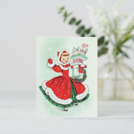 クリスマスのプレゼントと赤いドレスの小さな女の子 ポストカード (スタンド正面)