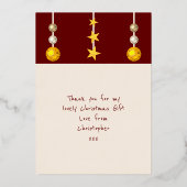 クリスマスのプレゼントの写真を掲載したワインレッドのカード 箔シーズンカード (裏面)