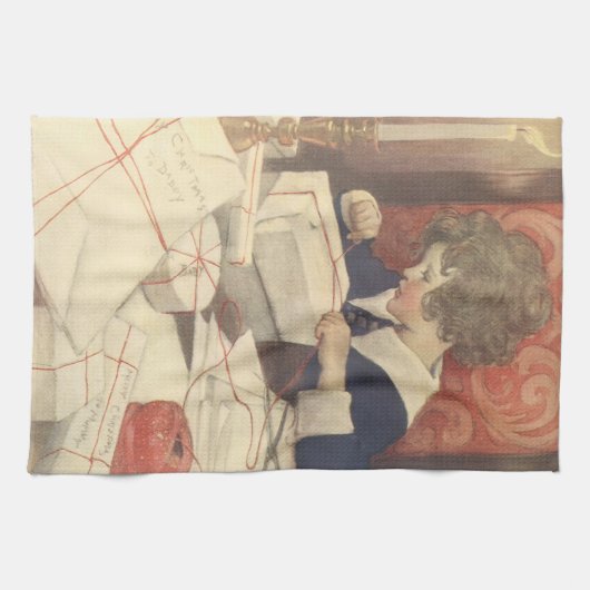 クリスマスのプレゼントをラッピングする、ジェシー・ウィルコックス・スミス キッチンタオル (横)