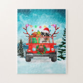 クリスマスのプレゼントを持つオーストラリアの羊飼いの犬 ジグソーパズル (縦)