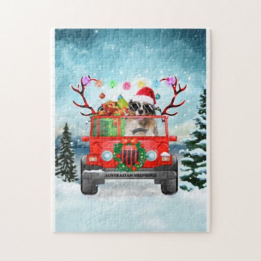 クリスマスのプレゼントを持つオーストラリアの羊飼いの犬 ジグソーパズル (縦)