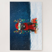 クリスマスのプレゼントを持つニューファンドランド犬 ジグソーパズル (縦)