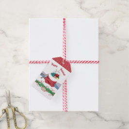 クリスマスのプレゼントを覗く子どものホッキョクグマ ギフトタグ