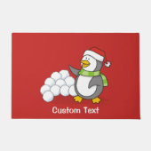 クリスマスのペンギンが雪玉を持って手を振っている ドアマット (正面)