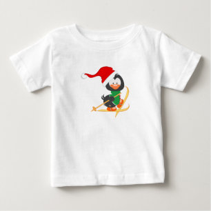 クリスマスのペンギンのスキー ベビーTシャツ