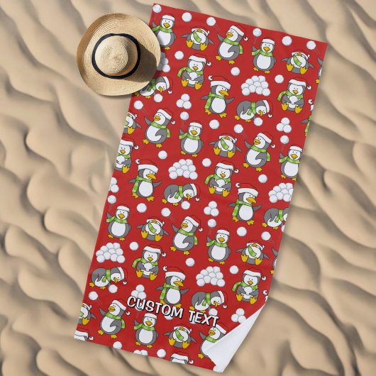 クリスマスのペンギンの背景 ビーチタオル