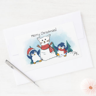クリスマスのペンギン達が雪の猫を作っています 長方形シール