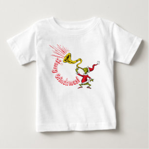 クリスマスのホーンを吹くグリンチ ベビーTシャツ