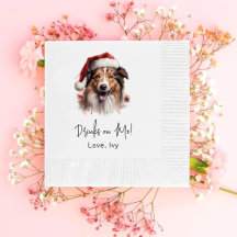 クリスマスのラフなコリーの犬が私に飲み物