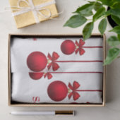 クリスマスのリボンが付いている赤いクリスマスの球 薄葉紙 (ギフト)