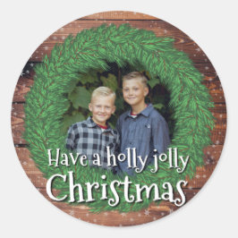 クリスマスのリースを持すてきっている ラウンドシール