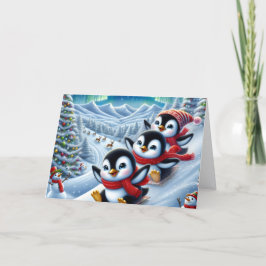 クリスマスの丘を滑り降りるかわいいペンギン シーズンカード
