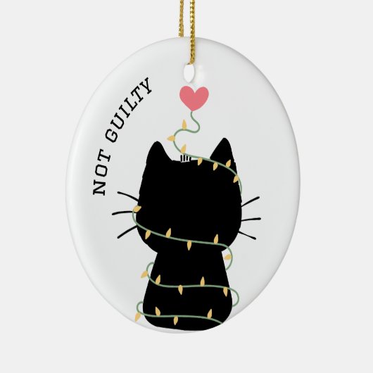 クリスマスの光に絡み合った可愛い黒い子猫 セラミックオーナメント (右)