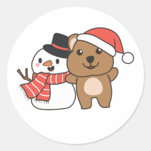クリスマスの冬に雪だるまを持つQuokka ラウンドシール