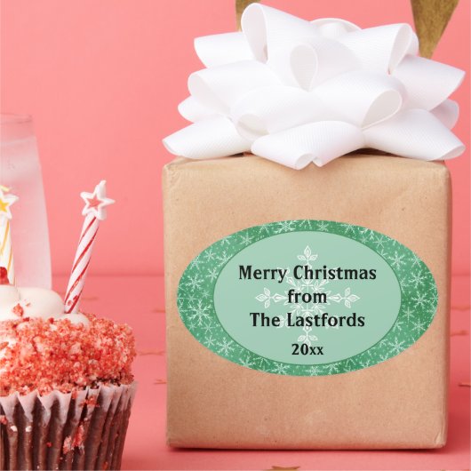 クリスマスの冬の雪の雪の花が降る緑 楕円形シール (パーティー)