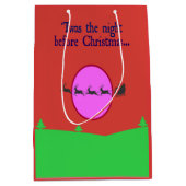 クリスマスの前の夜は空を通して過ごしていた ミディアムペーパーバッグ (正面)