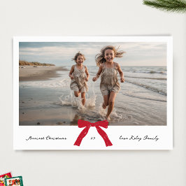 クリスマスの喜びあふれるレッドリボン ブラックインク 写真 ホリデー シーズンカード