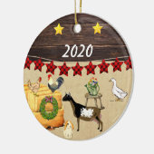 クリスマスの国のナイジェリア人の矮星ヤギ セラミックオーナメント (左)