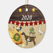 クリスマスの国のナイジェリア人の矮星ヤギ セラミックオーナメント (左)