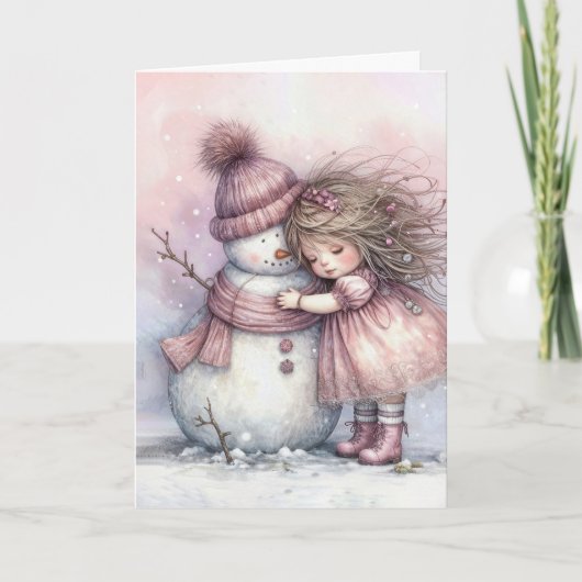 クリスマスの女の子が雪だるまを抱きしめる カード (正面)