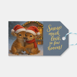 クリスマスの小屋の明かりの下のシカのカップル ギフトタグ