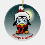 クリスマスの帽子の漫画を持つかわいいペンギン セラミックオーナメント (正面)