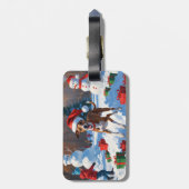 クリスマスの帽子をかぶったグレイハウンドの雪上奔走 ラゲッジタグ (裏面縦)