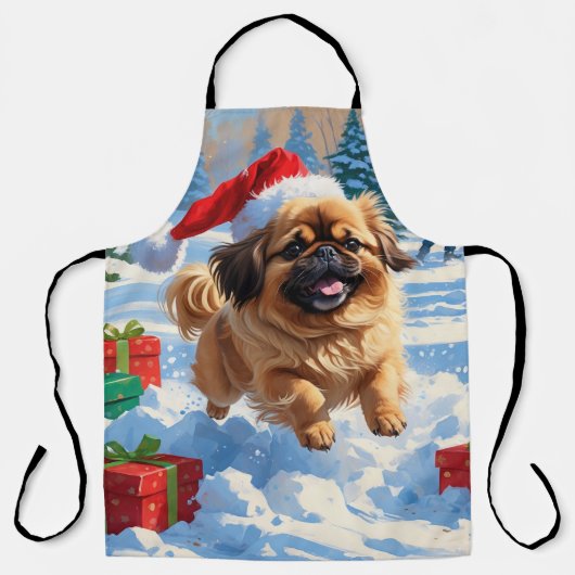 クリスマスの帽子をかぶった北京原産犬の雪の中でのランニング エプロン (正面)