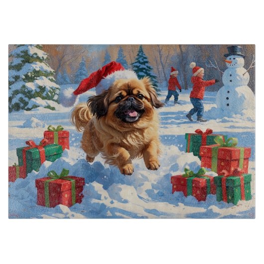 クリスマスの帽子をかぶった北京原産犬の雪の中でのランニング カッティングボード (正面)