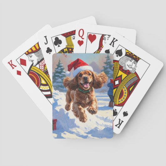 クリスマスの帽子をかぶって雪の中を走るコッカー・スパニエル トランプ (裏面)