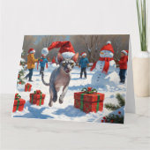 クリスマスの帽子をかぶって雪の中を走るスフィンクス猫 カード (正面)